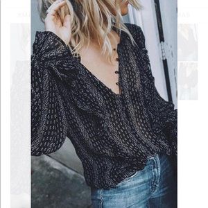 NWOT black rose blouse.